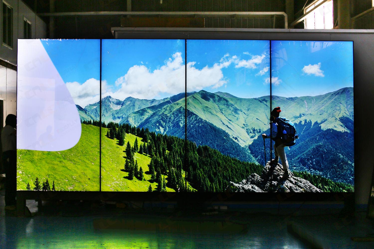 Factory installation example of LCD Video Wall showing modular assembly