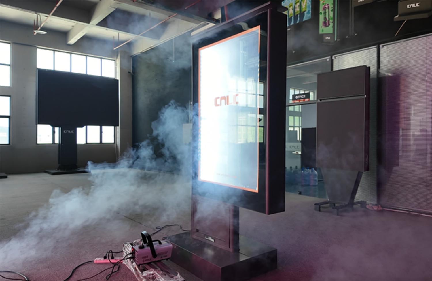 Smoke-based airflow visualization test inside an outdoor display enclosure